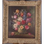 A 20th century oil, vase of flowers, 24" x 20", in swept gilt frame