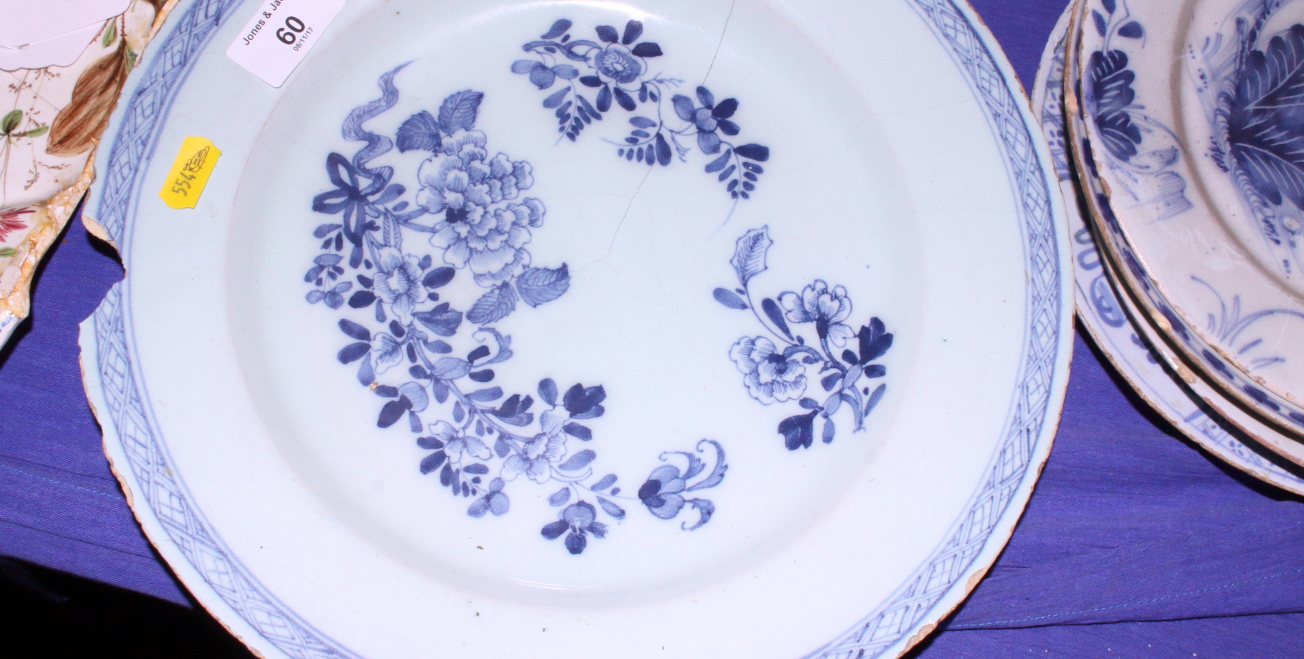 A Delft pottery blue and white charger decorated with sprays of flowers within a cross hatched - Image 3 of 4