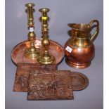 A pair of late Victorian brass baluster candlesticks, a copper and brass hammered jug, a copper alms