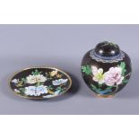 A modern cloisonne ginger jar and cover with floral decoration on a black ground, 7" high, and a