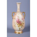 A late Victorian Royal Worcester blush ivory two-handled porcelain vase, shape number 1762,