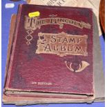 A Lincoln stamp album of World stamps and a number of cigarette cards, in an album