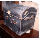 A leather bound trunk with lift out tray