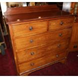 An Edwardian mahogany chest of two short and three long drawers, fronts inlaid decorative stringing,