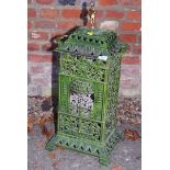 A Victorian green enamel decorated cast iron heater casing, 29" high
