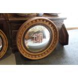 A 19th century plate convex gilt ball decorated wall mirror, 15" dia