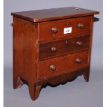 A late Victorian mahogany miniature chest of three long drawers, 12 1/2" wide