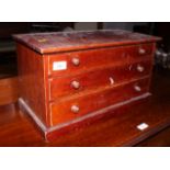 A specimen chest of three drawers