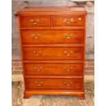 A Georgian design yew chest of two short and four long drawers, 31" wide