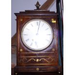 A Regency mahogany cased mantel clock with brass inlay decoration, the brass '