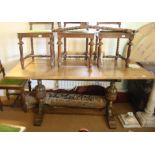 An oak refectory design dining table, on Elizabethan design carved cup and cover end supports, 72" x