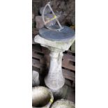 A brass sundial, on cast stone pedestal, 36" high overall