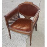 An Edwardian bow back low seat nursing chair, a Victorian footstool and a carved feather back chair