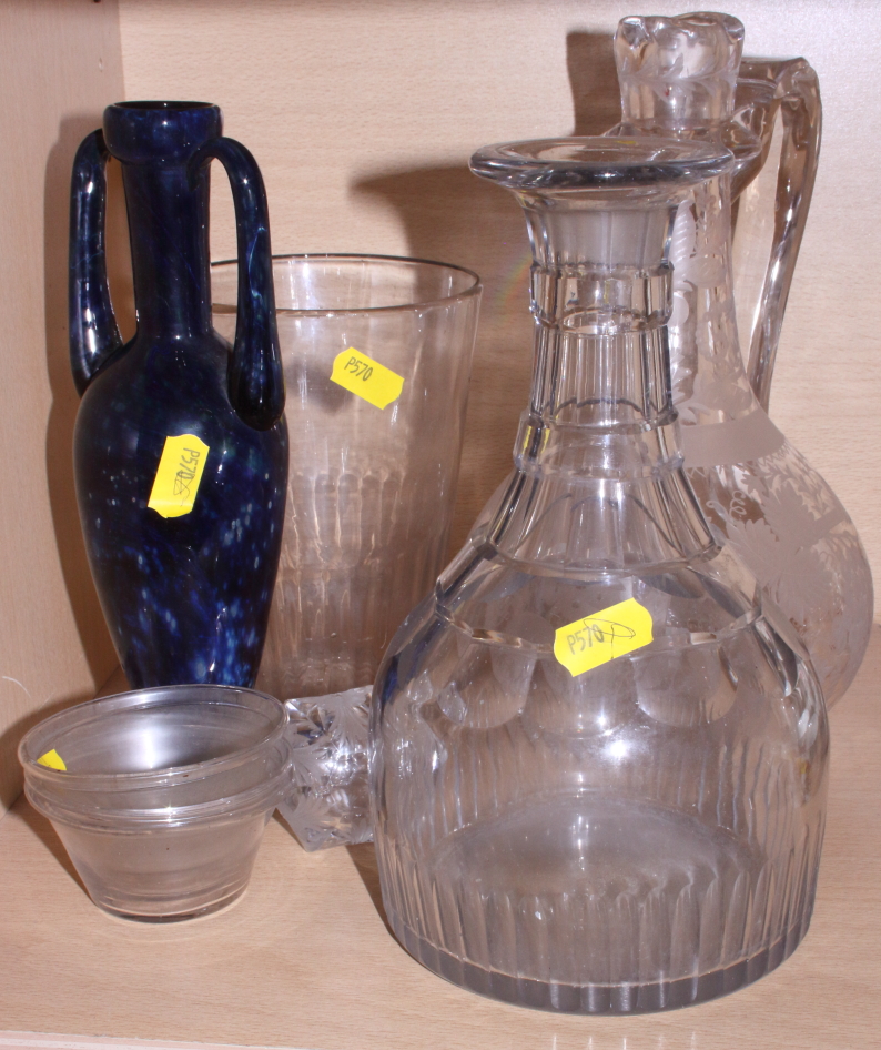 A 19th century engraved glass claret jug and stopper, a late 18th century faceted decanter and other