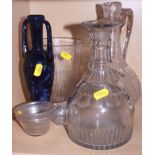 A 19th century engraved glass claret jug and stopper, a late 18th century faceted decanter and other