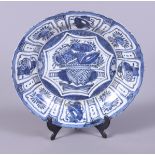 A 19th century Chinese Kraak porcelain blue and white charger, painted with flowers, within a border