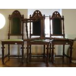 A set of six 17th century design oak dining chairs with back and seat panels upholstered in a