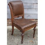 A set of six Victorian mahogany framed dining chairs with scroll-shaped backs and seats
