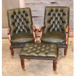 A pair of 19th century design open armchairs with buttoned backs, seats and arm rests, upholstered
