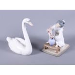 A Lladro porcelain figure, "Oriental Girl", together with a Lladro porcelain model, "Graceful Swan"