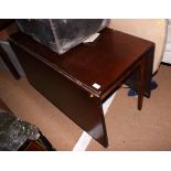 A 19th century mahogany drop leaf dining table, on square supports, 42" x 60" when fully extended