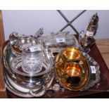 A silver plated entree dish and cover with glass liner, two plated coasters, a pair of plated