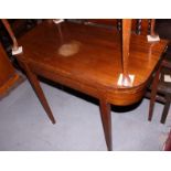 A 19th century mahogany fold-over top card table, on square tapered supports, 36" wide (water mark