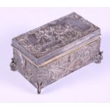 A Continental silver casket with embossed decoration depicting musicians, 7.7oz troy approx