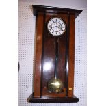 A 19th century Vienna regulator clock in glazed case, 33" high