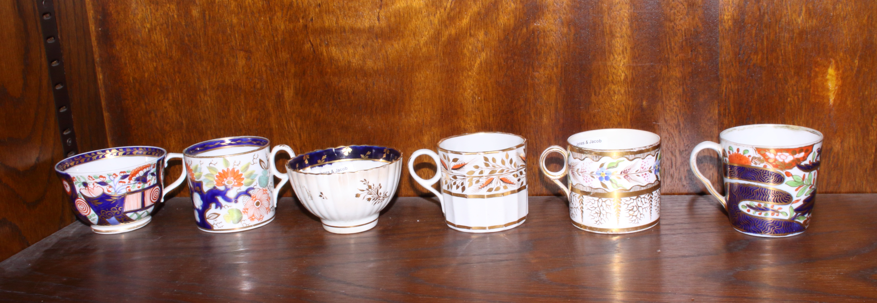 Five early 19th century English porcelain coffee cans, including Minton, Chamberlains Worcester "