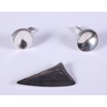 Henning Koppel for Georg Jensen, a silver brooch no 327, and a pair of Georg Jensen silver cufflinks