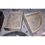 A stoneware quadrant sink and a similar rectangular sink