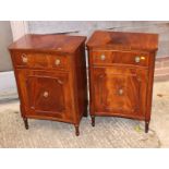 A pair of Georgian design crossbanded mahogany bedside cabinets, fitted drawer and lower cupboard,