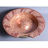An early 18th century Hispano Moresque shaving bowl with traditional design, 14" dia (restorations)