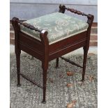 A stained as mahogany box seat piano stool with turned side rails