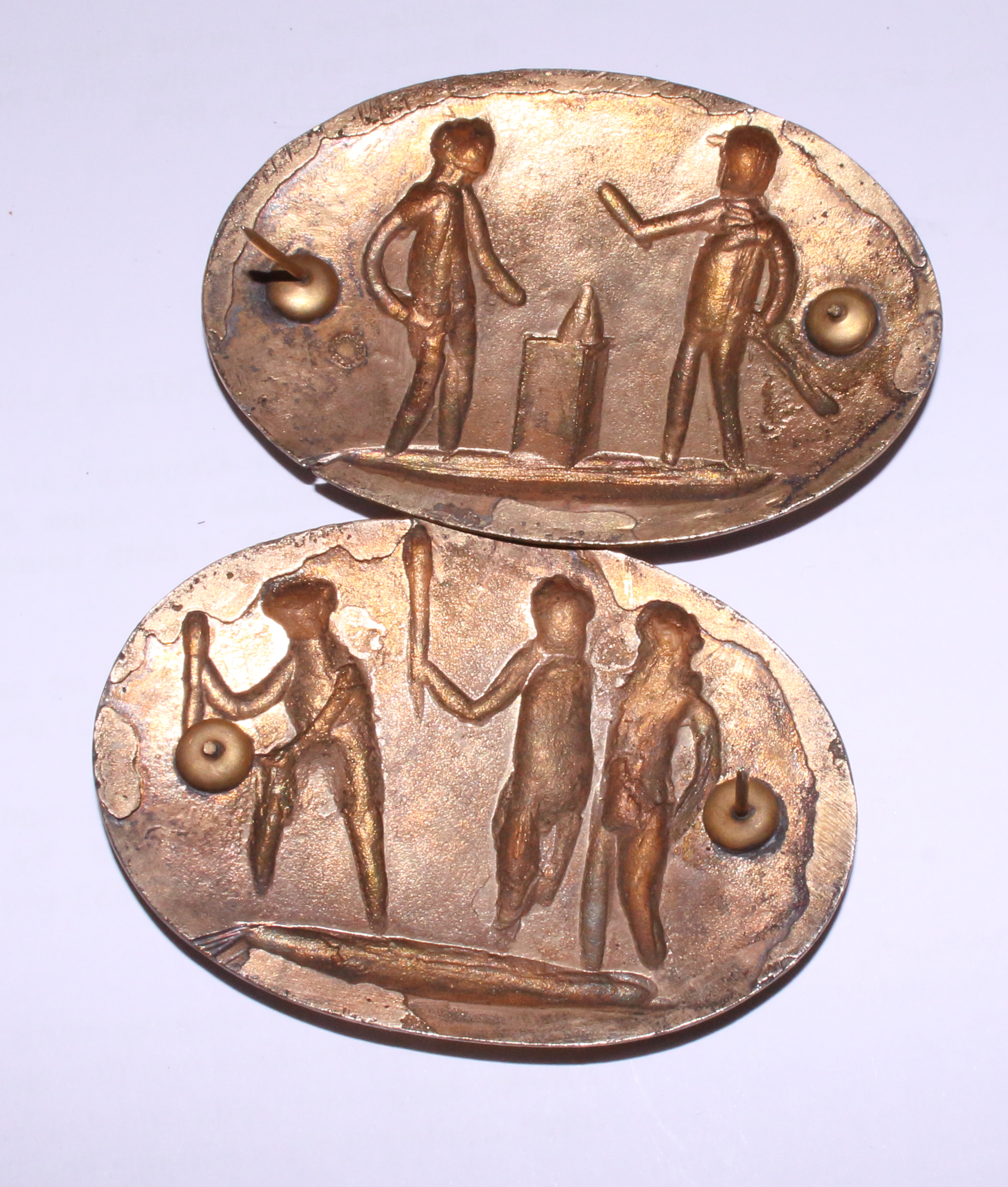 A pair of 19th century gilt metal oval brooches, panels with cherubs and Putti, 2 3/4" x 1 1/4" - Image 2 of 4