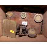 A set of early 20th century brass postal scales and a collection of assorted brass and iron weights