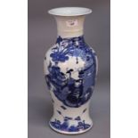 A Chinese blue and white porcelain baluster vase decorated with Chinese man seated in a garden,