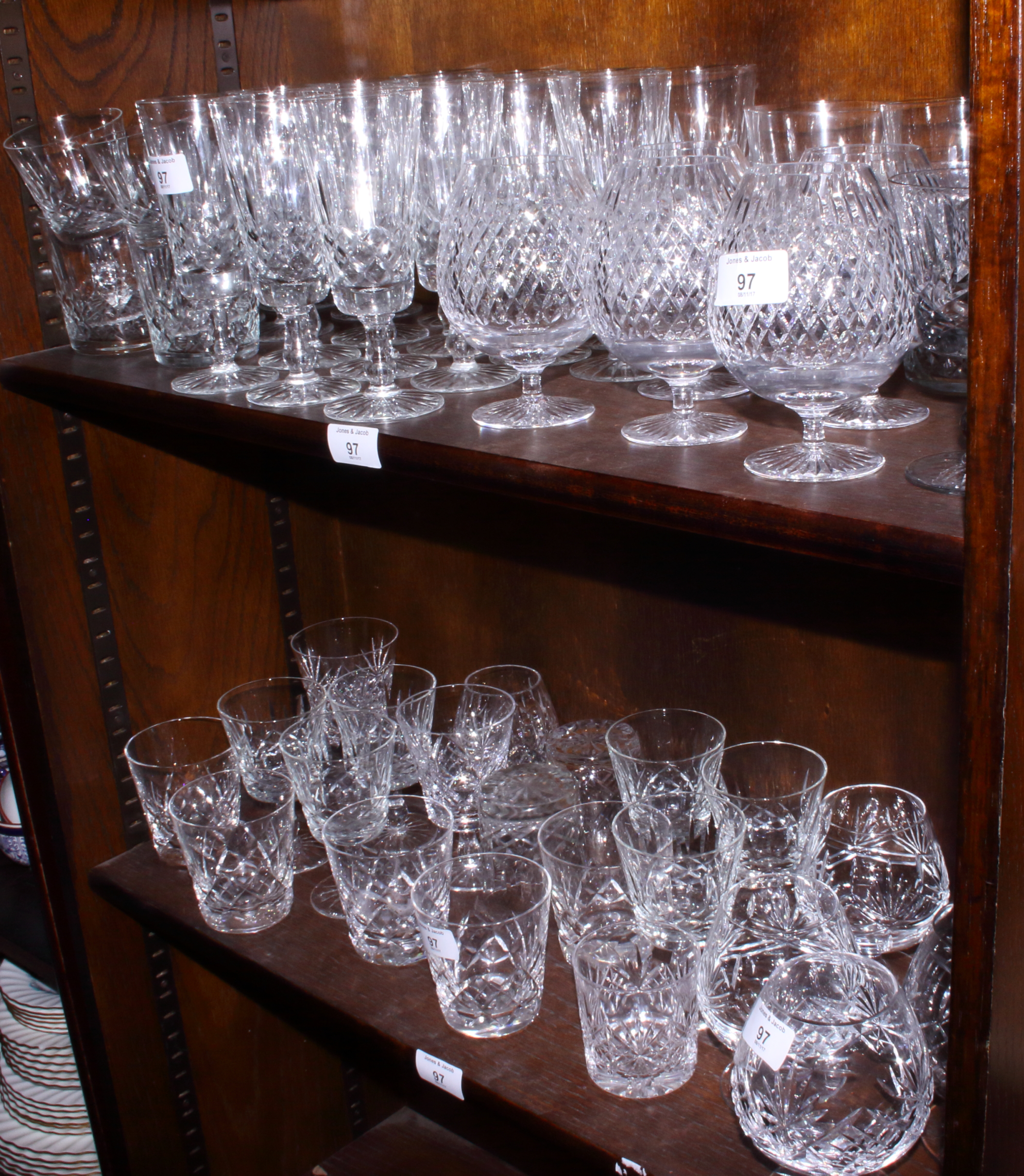 A set of seven Stuart crystal glass tumblers and other assorted part sets of glasses