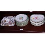 A 19th century floral decorated bone china part dessert service, nine plates and three stands and