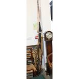 A Hobson J C Scott double cane handled fishing rod, another double handled rod, a 54" bait casting