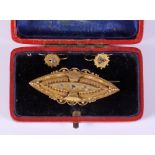 A Victorian 15ct gold navette-shaped brooch and matching earrings, 7.4g gross
