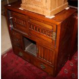 A Chinese cabinet, fitted five drawers and sliding doors, 33" wide