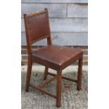 A set of six Waring & Gillows oak dining chairs, on square supports with chamfered design and a