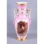 A late 19th century Continental porcelain two-handled vase with figure decorated panel on a pink and