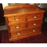 A pine chest of two short and two long drawers