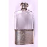 A glass pocket flask with silver lid and removable cup