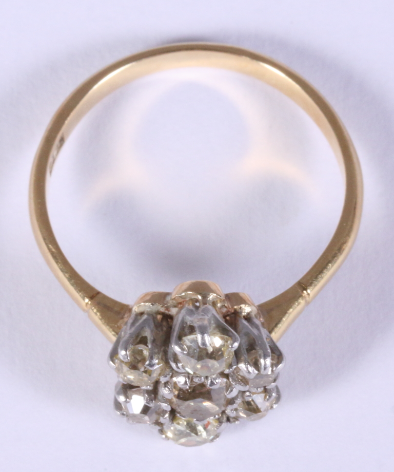 An 18ct gold and diamond seven stone cluster ring, size O - Image 2 of 2