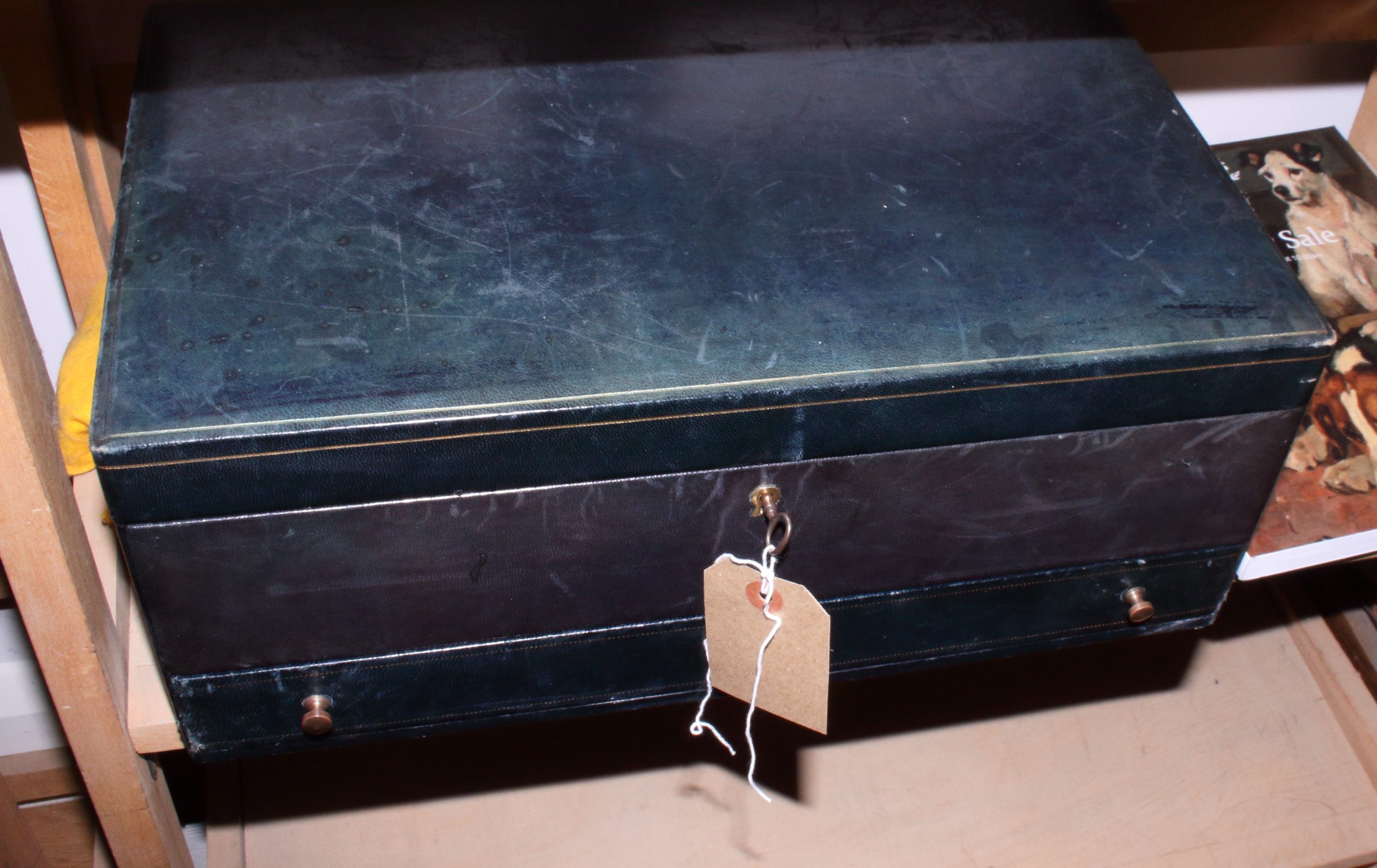 An assortment of costume jewellery, in blue leather case