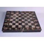 A collection of box and ebony chess pieces, various, and a mother-of-pearl inlaid chess and